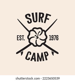 Surf camp badge outline icon with texts, crossed surf boards and central flower.