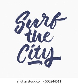 Surf the city. Ink hand lettering. Modern brush calligraphy. Handwritten phrase. Inspiration graphic design typography element. Cute simple vector sign.