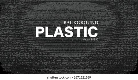The surface of the rough, uneven black plastic.