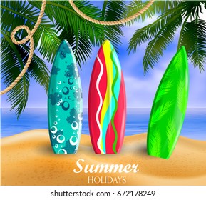 surfboards on a beach against a sunny seascape