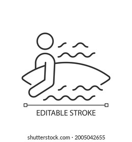 Surfer entering water linear icon. Surfing for first time. Holding board correctly. Thin line customizable illustration. Contour symbol. Vector isolated outline drawing. Editable stroke