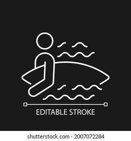 Surfer entering water white linear icon for dark theme. Surfing for first time. Holding surfboard. Thin line customizable illustration. Isolated vector contour symbol for night mode. Editable stroke