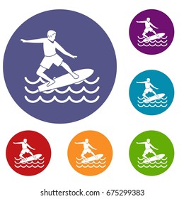 Surfer man icons set in flat circle reb, blue and green color for web