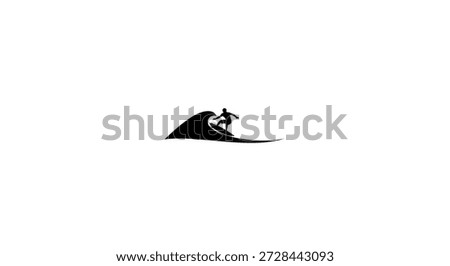 surfer riding a wave in a distinctive silhouette