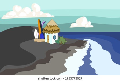 A surfer's bungalow with surf boards on a black sand beach at seaside with waves.