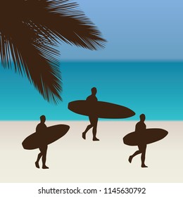 surfers and tropical beach