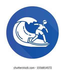 Surfing blue flat design long shadow glyph icon.Watersport, extreme kind of sport. Catching ocean wave, surfer balancing on board. Summer activity and hobby. Vector silhouette illustration