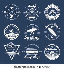 Surfing emblems on dark with descriptions of summer trip surfing school and surfing paradise vector illustration