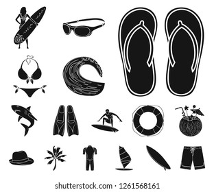 Surfing and extreme black icons in set collection for design. Surfer and accessories vector symbol stock web illustration.
