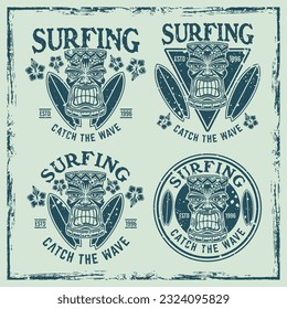 Surfing set of vector emblems, badges, labels, stickers or logos with tiki head and surfboards. Illustration in colored vintage style with removable grunge textures