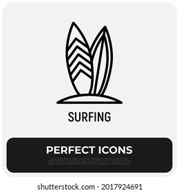 Surfing thin line icon, two surfboards in sand. Modern vector illustration of summer sport.
