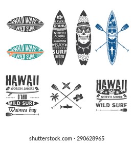 Surfing vector emblem set with hawaiian lei, surfboard, shark teeth, shark, skull and paddle.