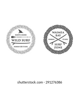 Surfing vector emblem set with hawaiian lei, surfboard, shark fin and paddle.