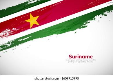 Suriname flag made in brush stroke background. National day of Suriname. Creative Suriname national country flag icon. Abstract painted grunge style brush flag background.