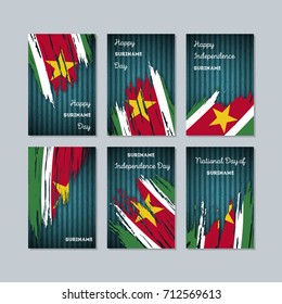 Suriname Patriotic Cards for National Day. Expressive Brush Stroke in National Flag Colors on dark striped background. Suriname Patriotic Vector Greeting Card.