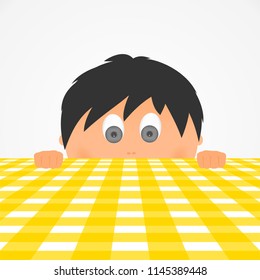 Surprise boy children's face with black hair color and gray eyes with fingers on the table and looking over the yellow square tablecloth. Combed child with ears 