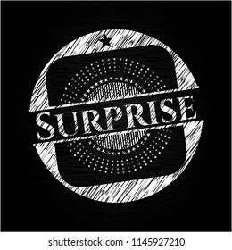 Surprise chalk emblem written on a blackboard