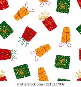 Surprise gift boxes seamless vector pattern. Present for Christmas, birthday, holidays. Golden, red and green containers tied with a ribbon. Flat cartoon background. Illustration for fabrics, prints