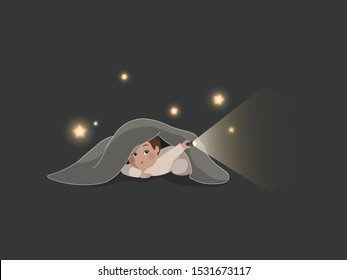 A surprised boy with dark hair and eyes in light beige pajamas hides under a gray blanket in his bed, shines a flashlight and looks at flying glowing stars at night against a dark neutral background.