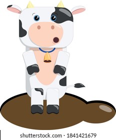 Surprised cow stands in a puddle