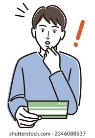Surprised man looking at the passbook