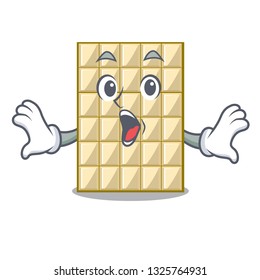 Surprised white chocolate on mascot wood table