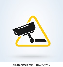 Surveillance camera warning sign icon or logo. Security Alarm  concept. Surveillance CCTV Camera vector illustration.