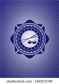 sushi icon inside badge with denim texture