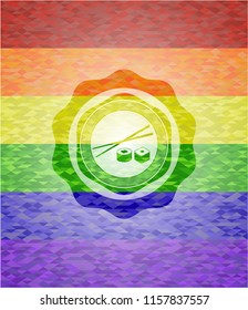 sushi icon inside emblem on mosaic background with the colors of the LGBT flag