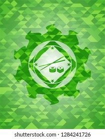 sushi icon inside green emblem with triangle mosaic background