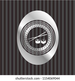 sushi icon inside silver emblem or badge