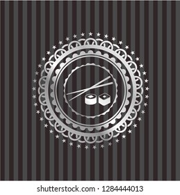 sushi icon inside silver emblem