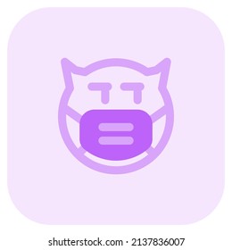 suspicious devil looking at left side while wearing the mask
