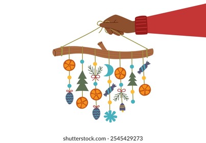 Sustainable Christmas concept. Eco friendly Christmas decoration in human hand isolated on white. Ecological garland.