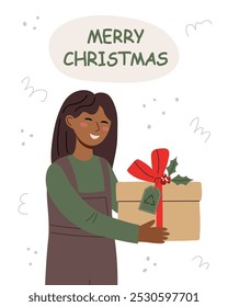 Sustainable Christmas concept. Girl holding Christmas paper gift box. Eco friendly Christmas card.