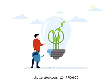 sustainable ecology and energy concept, green idea or protection against world climate change, environmental care, smart businessman watering sprouts growing inside green light bulb idea.