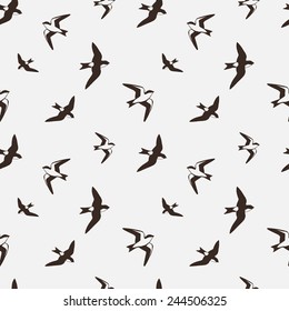 Swallows. Seamless pattern. Vector illustration. 
