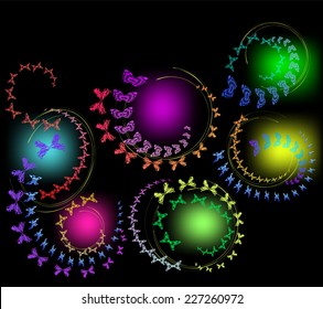 Swarm of butterflies and moth on a black background