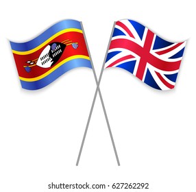 Swazi and British crossed flags. Swaziland combined with United Kingdom isolated on white. Language learning, international business or travel concept.