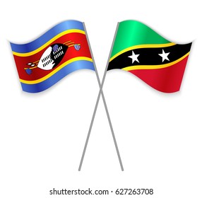 Swazi and Kittitian crossed flags. Swaziland combined with Saint Kitts and Nevis isolated on white. Language learning, international business or travel concept.