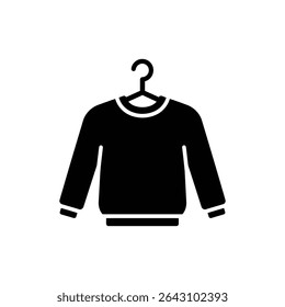 Sweater Hanging on Hook for a Cozy Winter Wardrobe Moment