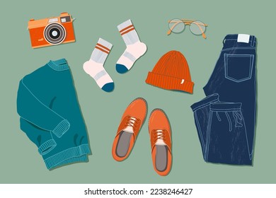 Pullover, Jeans, Brillen, Socken, Hut, Oxford Schuhe und Filmkamera flach legen Stil. Trendy top-down-View Illustration. Herbststimmung. Modermoderne minimalistische Gruppe von Kleiderdesign für Web-Karte, Banner