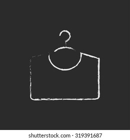 Sweater on hanger hand drawn in chalk on a blackboard vector white icon isolated on a black background.