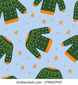 Sweater seamless pattern on a blue background. Green, yellow, blue colors. Autumn and winter collection. Vector hand drawn illustration.