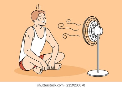 Sweating And Cooling Air Concept. Young Positive Man In Sportswear Sitting On Floor Sweating And Enjoying Work On Air Fan Wind Vector Illustration 