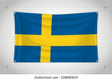Sweden flag hanging on brick wall. 3D drawing. Flag attached to the wall. Neatly drawing in groups on separate layers for easy editing.