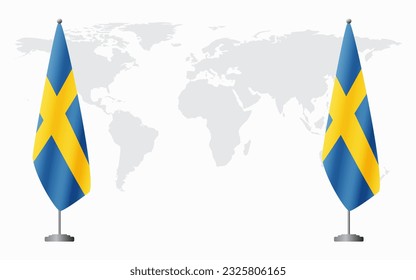 Sweden and Sweden flags for official meeting against background of world map.