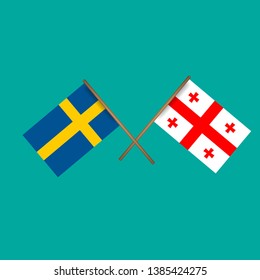 Sweden and Georgia crossed flags.Language learning or travel concept