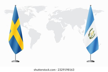 Sweden and Guatemala flags for official meeting against background of world map.