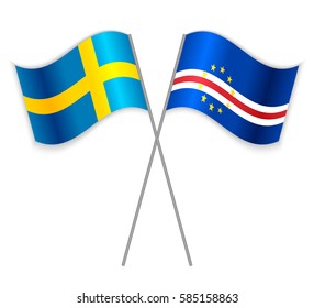 Swedish and Cabo Verdean crossed flags. Sweden combined with Cape Verde isolated on white. Language learning, international business or travel concept.